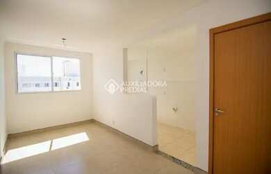 Imagem: O apartamento possui 2 Dormitórios, 1 Banheiro, 1 Vaga na garagem