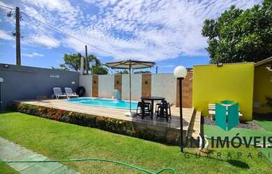 Imagem: A casa possui 2 Dormitórios, 2 Banheiros, 3 Vagas na garagem