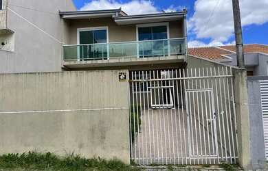 Imagem: A casa possui 3 Dormitórios, 2 Banheiros, 2 Vagas na garagem