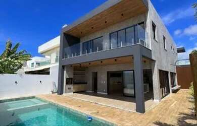 Imagem: A casa possui 3 Dormitórios, 5 Banheiros, 2 Vagas na garagem