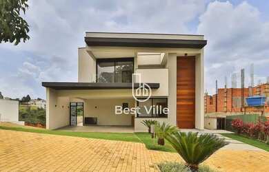 Imagem: A casa em condomínio e possui 4 Dormitórios, 5 Banheiros