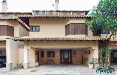 Imagem 2: Casa com 327m² de área privativa, oferecendo 3 dormitórios, sendo 3...