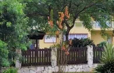 Imagem: A casa em condomínio possui 4 Dormitórios, 4 Banheiros, 5