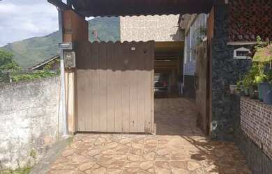 Imagem: A casa possui 3 Dormitórios, 1 Banheiro, 1 Vaga na garagem