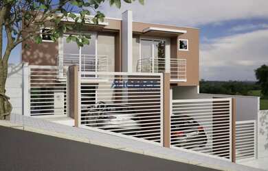 Imagem: A casa à venda possui 2 Dormitórios, 2 Banheiros, 2 Vagas