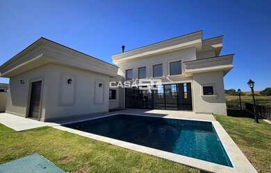 Imagem: A casa em condomínio possui 4 Dormitórios, 5 Banheiros, 5