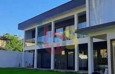 Imagem: A casa possui 3 Dormitórios, 4 Banheiros, 2 Vagas na garagem