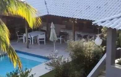 Imagem: A casa em condomínio possui 5 Dormitórios, 5 Banheiros, 3