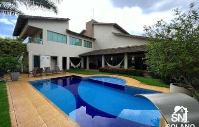 Imagem: A casa em condomínio possui 4 Dormitórios, 5 Banheiros, 5