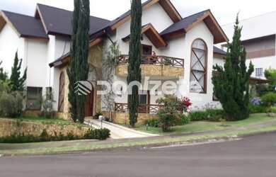 Imagem: A casa possui 5 Dormitórios, 5 Banheiros, 5 Vagas na garagem