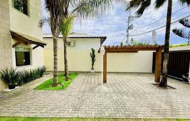 Imagem: A casa possui 4 Dormitórios, 5 Banheiros, 2 Vagas na garagem