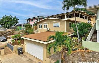 Imagem: A casa possui 4 Dormitórios, 3 Banheiros, 2 Vagas na garagem