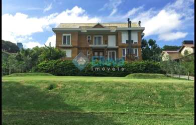 Imagem: A casa possui 4 Dormitórios, 5 Banheiros, 2 Vagas na garagem