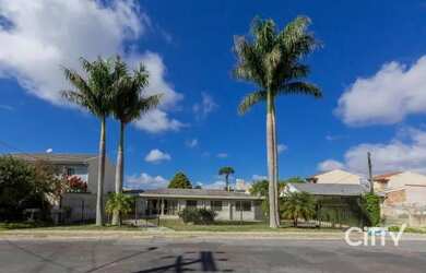 Imagem: A casa possui 4 Dormitórios, 5 Banheiros, 5 Vagas na garagem