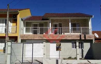 Imagem: A casa possui 2 Dormitórios, 2 Banheiros, 1 Vaga na garagem