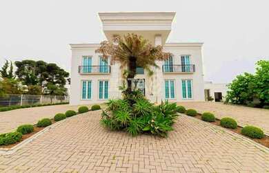 Imagem: A casa em condomínio possui 5 Dormitórios, 5 Banheiros, 5