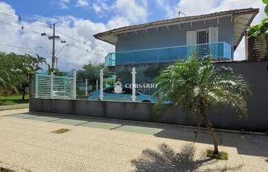 Imagem: A casa possui 3 Dormitórios, 2 Banheiros, 2 Vagas na garagem