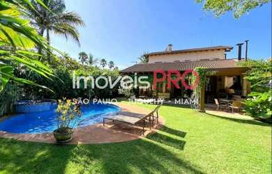 Imagem: A casa em condomínio possui 4 Dormitórios, 5 Banheiros, 4