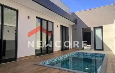 Imagem: A casa possui 3 Dormitórios, 3 Banheiros, 2 Vagas na garagem