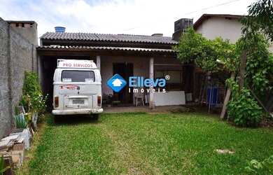 Imagem: A casa possui 2 Dormitórios, 1 Banheiro, 2 Vagas na garagem