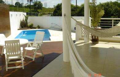 Imagem: A casa em condomínio possui 5 Dormitórios, 5 Banheiros, 4