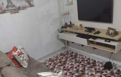 Imagem: A casa possui 3 Dormitórios, 2 Banheiros, 1 Vaga na garagem