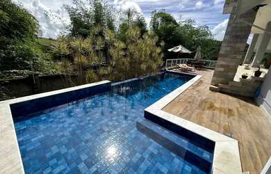 Imagem: A casa em condomínio possui 4 Dormitórios, 5 Banheiros, 2