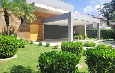 Imagem: A casa em condomínio possui 5 Dormitórios, 5 Banheiros, 5