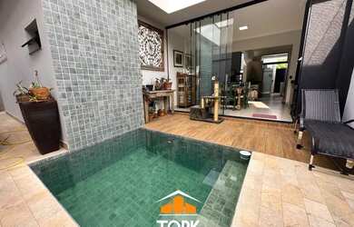 Imagem: A casa em condomínio possui 3 Dormitórios, 3 Banheiros, 2