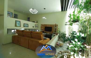 Imagem: A casa possui 3 Dormitórios, 4 Banheiros, 2 Vagas na garagem