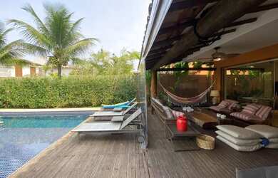 Imagem: A casa possui 4 Dormitórios, 4 Banheiros, 2 Vagas na garagem