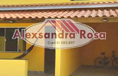 Imagem: A casa possui 4 Dormitórios, 5 Banheiros, 4 Vagas na garagem