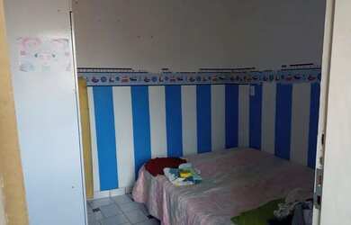 Imagem: A casa possui 2 Dormitórios, 2 Banheiros, 90m² de Área e