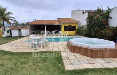 Imagem: A casa possui 5 Dormitórios, 5 Banheiros, 4 Vagas na garagem