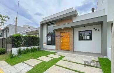 Imagem 3: Casa em Porto Alegre, no bairro Hípica, com 3 dormitório s , e 3 banheiros,...