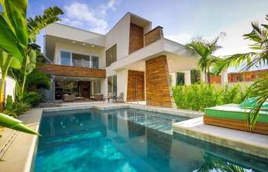 Imagem: A casa possui 5 Dormitórios, 5 Banheiros, 3 Vagas na garagem