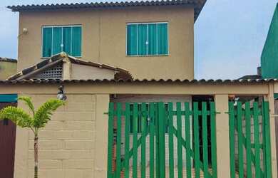 Imagem: A casa possui 2 Dormitórios, 2 Banheiros, 1 Vaga na garagem