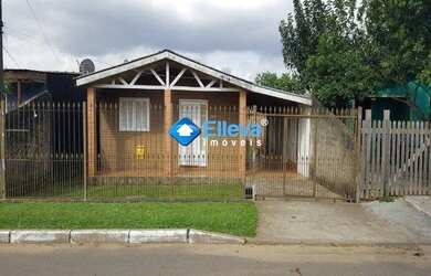 Imagem: A casa possui 2 Dormitórios, 1 Banheiro, 1 Vaga na garagem