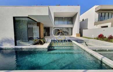 Imagem: A casa em condomínio possui 5 Dormitórios, 5 Banheiros, 3