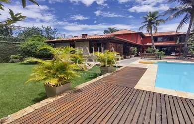 Imagem: A casa em condomínio possui 5 Dormitórios, 5 Banheiros, 4