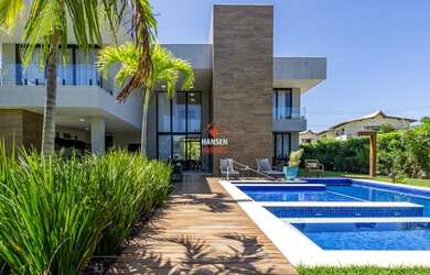 Imagem: A casa em condomínio possui 5 Dormitórios, 5 Banheiros, 2