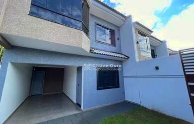 Imagem: A casa possui 3 Dormitórios, 2 Banheiros, 2 Vagas na garagem