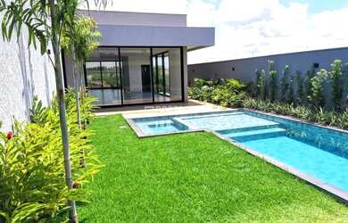 Imagem: A casa possui 4 Dormitórios, 5 Banheiros, 3 Vagas na garagem