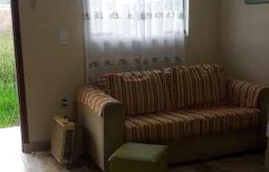 Imagem: A casa possui 2 Dormitórios e 1 Banheiro e está localizado