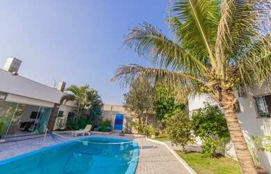 Imagem: A casa possui 4 Dormitórios, 5 Banheiros, 3 Vagas na garagem