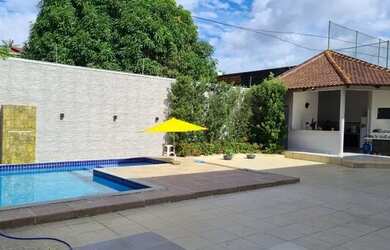 Imagem: A casa em condomínio possui 5 Dormitórios, 5 Banheiros, 4