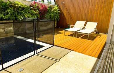 Imagem: A casa possui 5 Dormitórios, 5 Banheiros, 2 Vagas na garagem