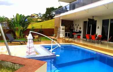 Imagem: A casa em condomínio possui 3 Dormitórios, 5 Banheiros, 5