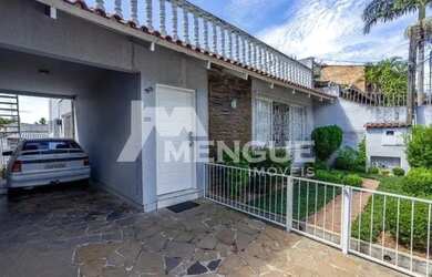 Imagem: A casa possui 3 Dormitórios, 4 Banheiros, 4 Vagas na garagem