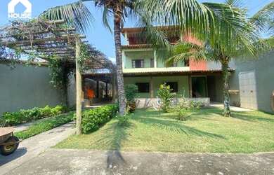 Imagem: A casa possui 5 Dormitórios, 4 Banheiros, 5 Vagas na garagem